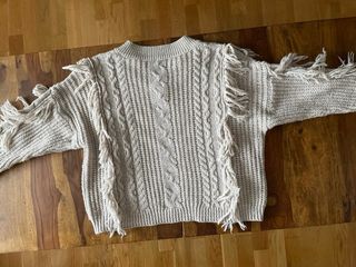 Jersey beige con flecos