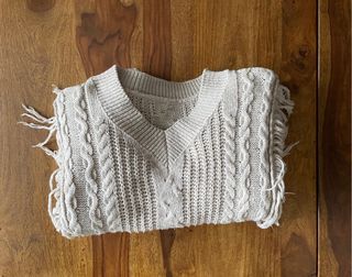 Jersey beige con flecos