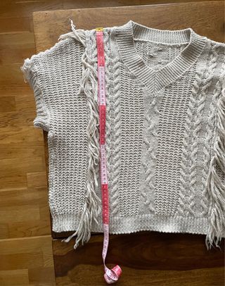 Jersey beige con flecos