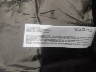 Cazadora Couchel gris con etiqueta