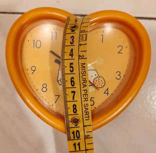 Sveglia arancione a cuore.
