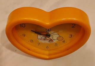 Sveglia arancione a cuore.