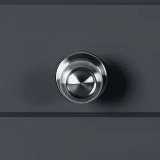 Puerta de entrada metálica con fijo lateral gris