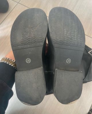 Stivali neri in simil pelle con fibbia argento