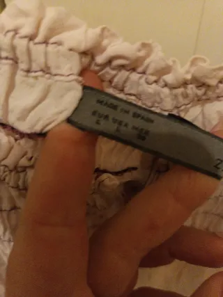 Blusa abullonada con botones