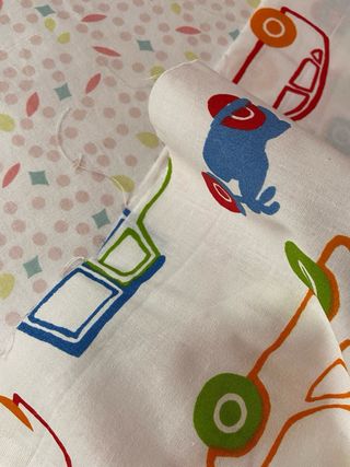 Tela infantil con coches y camiones,motos,etc