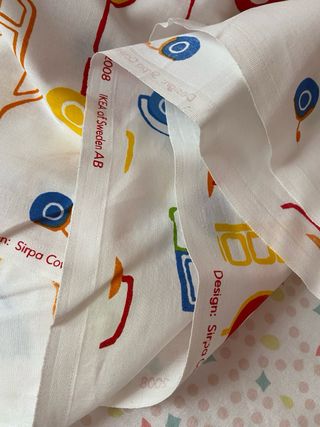 Tela infantil con coches y camiones,motos,etc