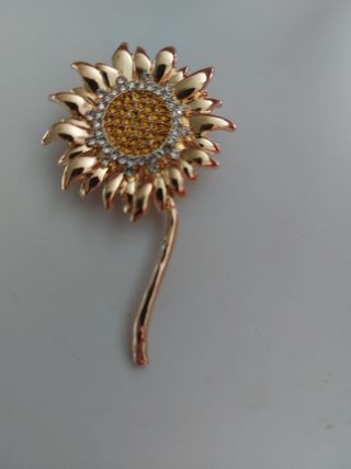 Broche girasol dorado con pedrería Joyas mujer top