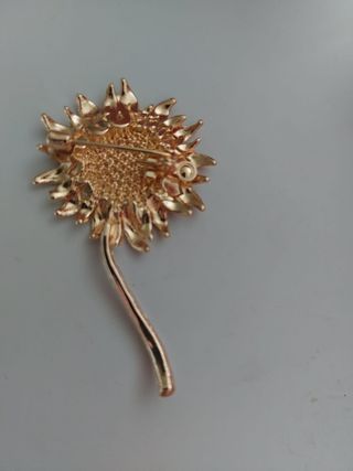 Broche girasol dorado con pedrería Joyas mujer top