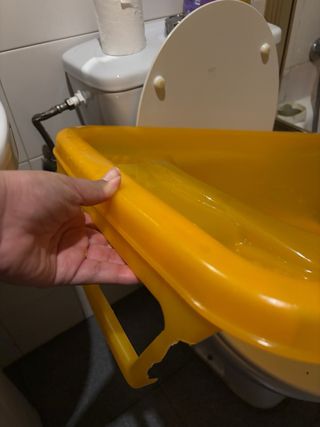 Cambiador bañera bebé naranja y verde