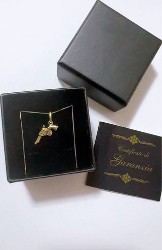 Collana con pendente pistola in oro 18kt 750