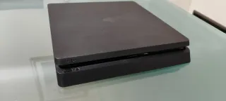 PS4 Slim 1TB Nera + 4 Giochi