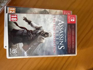 Nintendo Switch OLED + 3 Giochi e accessori