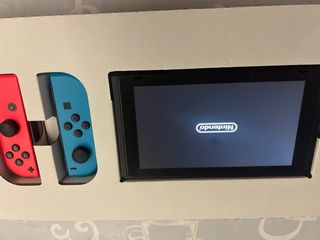 Nintendo Switch Azul y Naranja COMPLETA