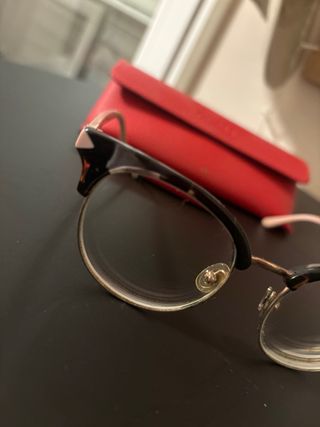 Gafas de ver Guess doradas y rosas