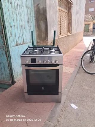 Cocina de gas con horno eléctrico