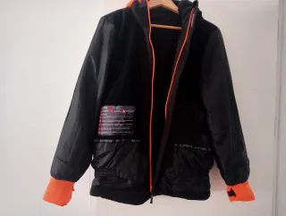 12€Abrigo BORIKEN  16 Años Negro detalles Naranja