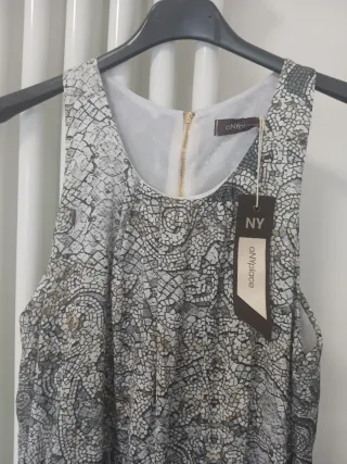 Abito fantasia geometrica