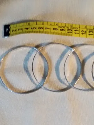 7 Brazaletes de plata italiana. Puntas de flecha.