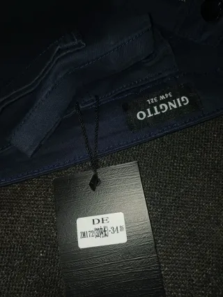 Pantaloni uomo blu nuovi con cartellino