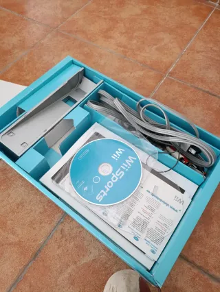 Nintendo Wii con Wii Sports in scatola