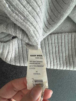 Maglione grigio collo alto