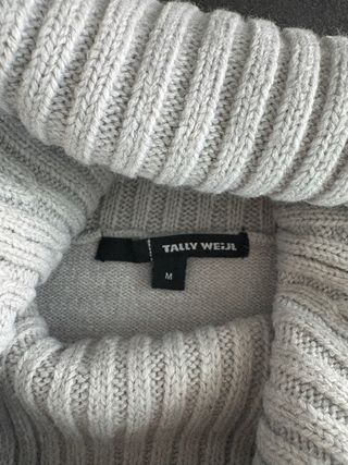 Maglione grigio collo alto