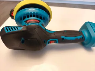 Pulidora orbital con 2 baterías