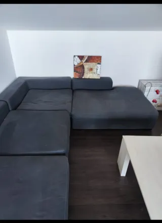 Sofá esquinero gris oscuro azulón de tela