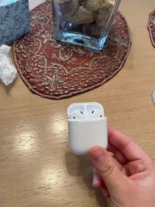 Airpods Apple Blancos.
