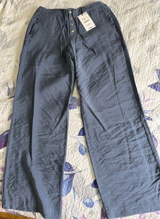 Pantalones Zara fluidos botones y cordón