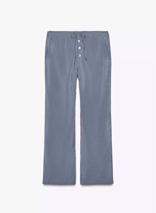 Pantalones Zara fluidos botones y cordón