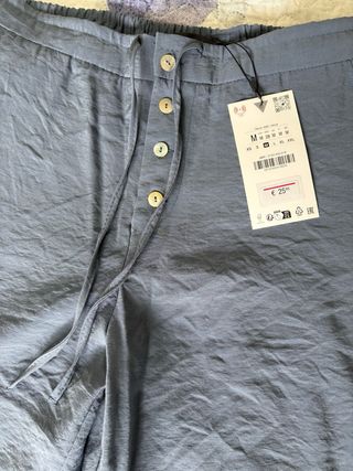 Pantalones Zara fluidos botones y cordón