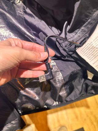 Abrigo negro con calefacción