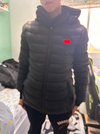 Abrigo negro con calefacción