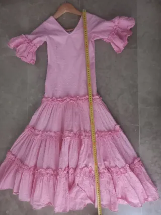 Traje de flamenca rosa volantes