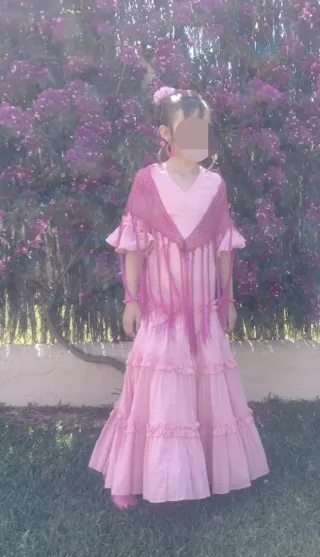 Traje de flamenca rosa volantes