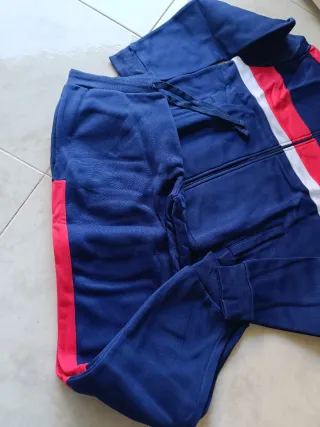 Tuta Bell Bottom felpata unisex blu e rossa