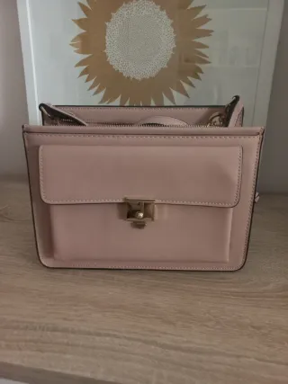 Bolso de mano y bandolera rosa