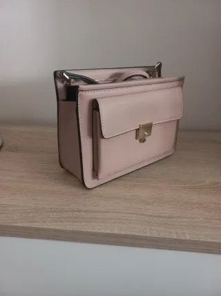 Bolso de mano y bandolera rosa