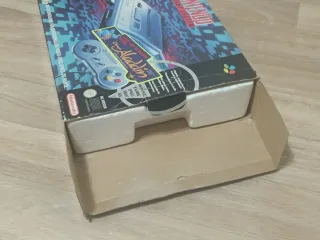 Scatola e polistirolo SNES