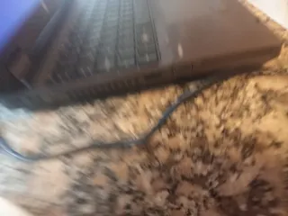 Ordenador portátil HP con cargador y batería