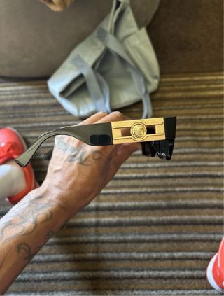 Occhiali da sole Versace Medusa neri e dorati