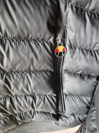 Piumino Ellesse nero con zip colorata