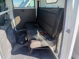 Camión Nissan Doble Cabina y caja abierta