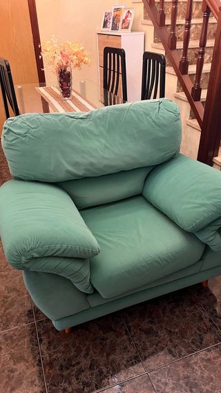 Sofá de tela verde