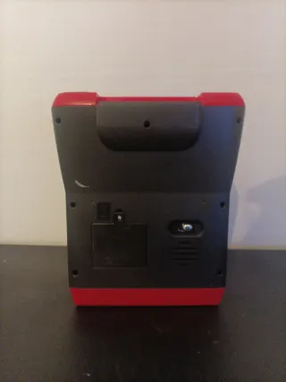 Cafetera de juguete roja y negra