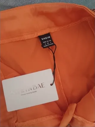 Conjunto pantalón y top naranja