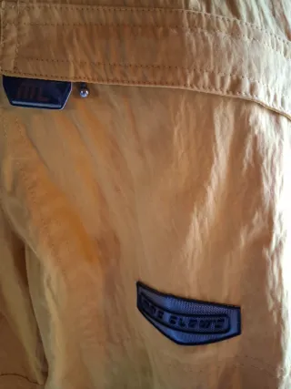 Chaqueta cortavientos hombre amarilla