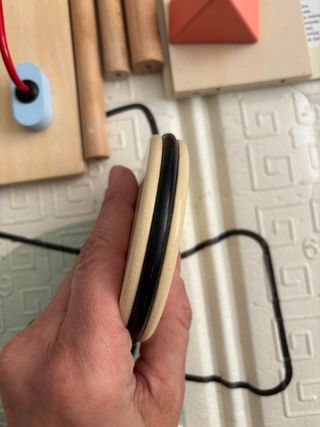 Andador de madera y centro actividades. Montessori